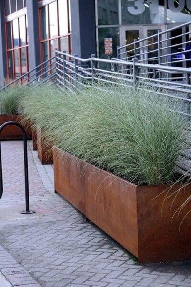 Rust Metal Planters Define Space