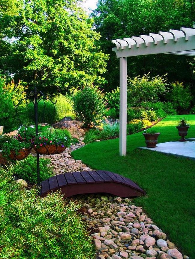 Pastel Garden With Wooden Bridge