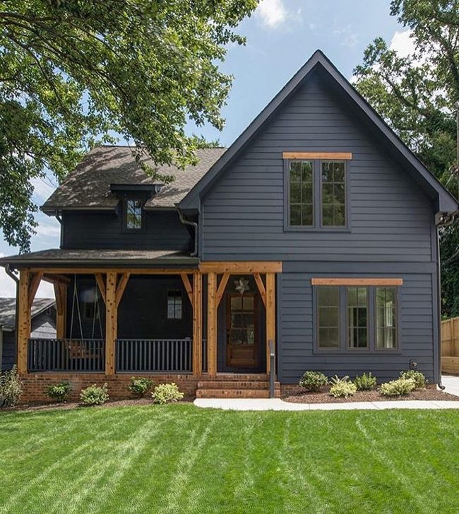 Navy Blue Walls With Warm Wood Details