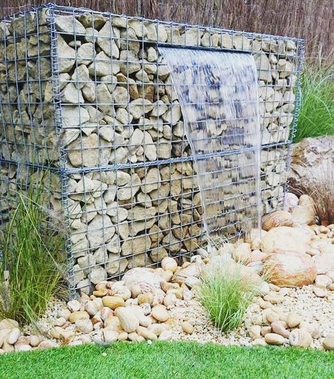 Cascading Water Through Stone Walls