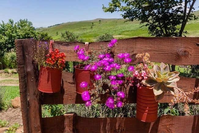 Recycled Metal Cans Blooming Fence