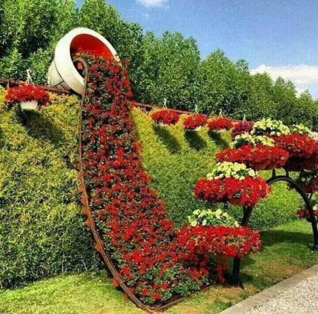 Flowers Spilling From Overturned Pots