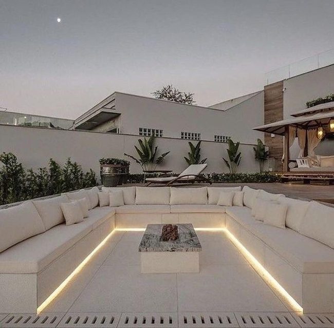 Cream Cushioned Seating With Firepit Centerpiece