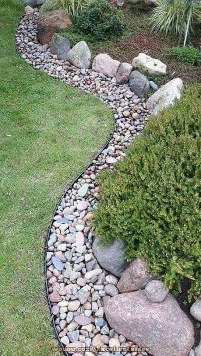 Curved Stone Path Through Green Lawn
