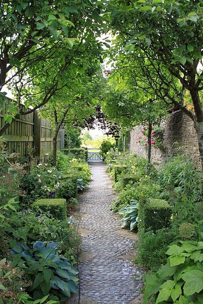 Blue Gate Through Green Corridor