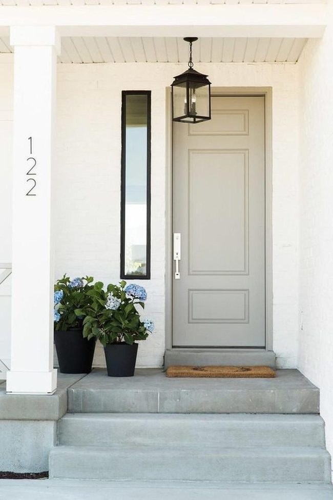 White Brick Entrance With Black Details
