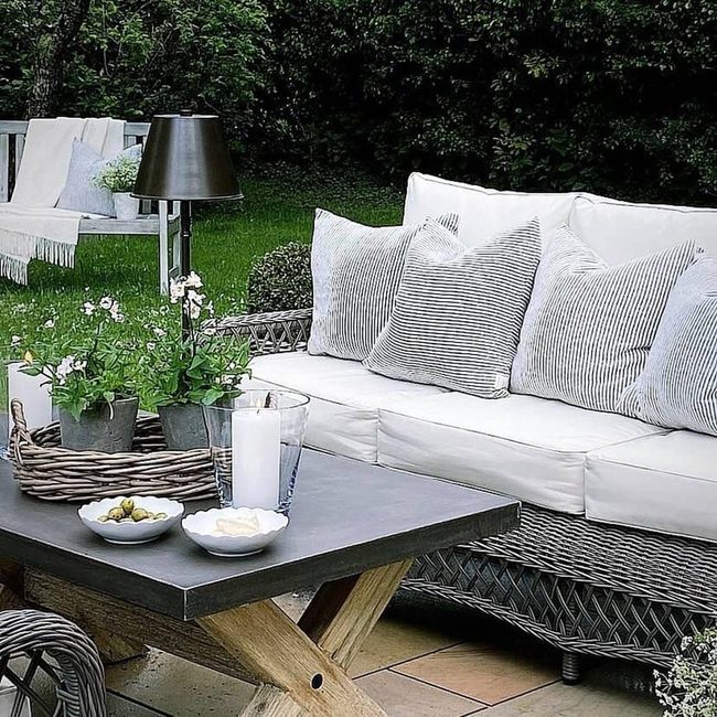 Striped Pillows Meet Rattan Elegance