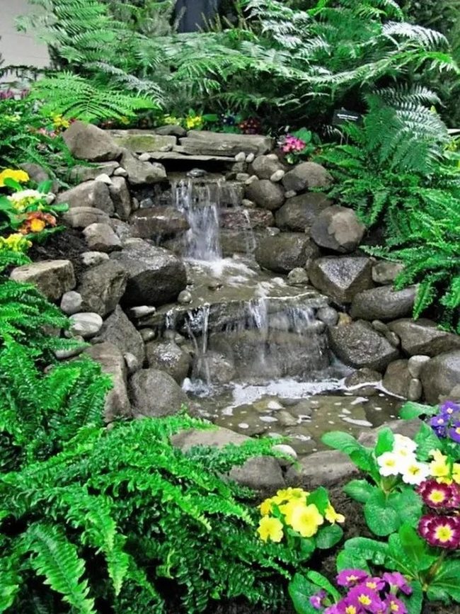 Cascading Water Through Emerald Stone