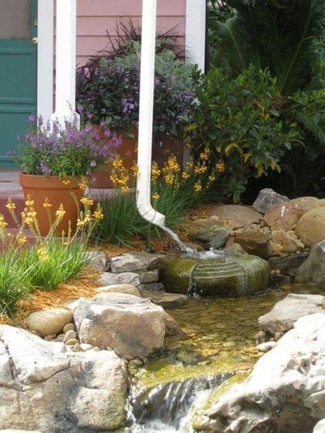Cascading Water Garden With Blooming Flowers