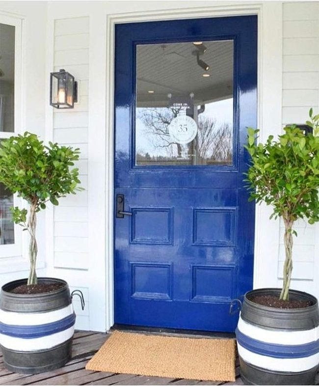 Blue Door With Striped Planters