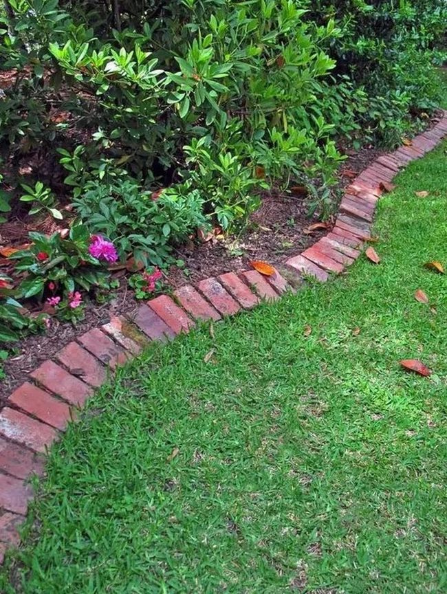 Green Grass, Red Brick, Pink Blooms