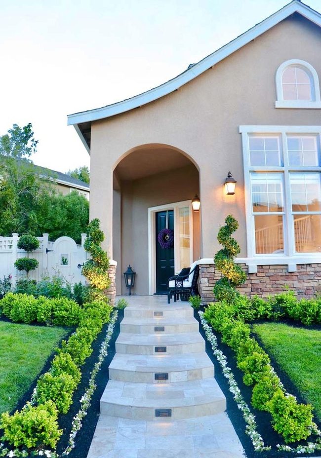 Green Boxwood Frames Stone Steps