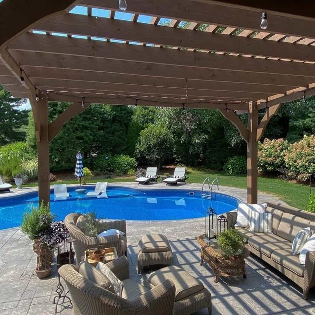 Stained Wood Pergola Over Swimming Pool