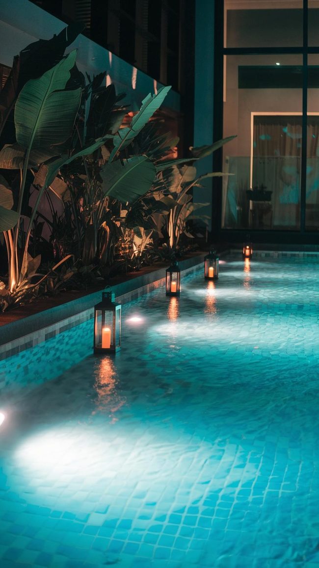 Poolside Nighttime Illumination Transforms Backyard