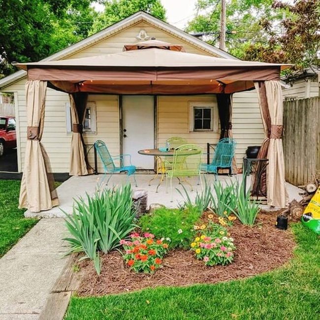 Garden Gazebo Surrounded By Blooming Roses