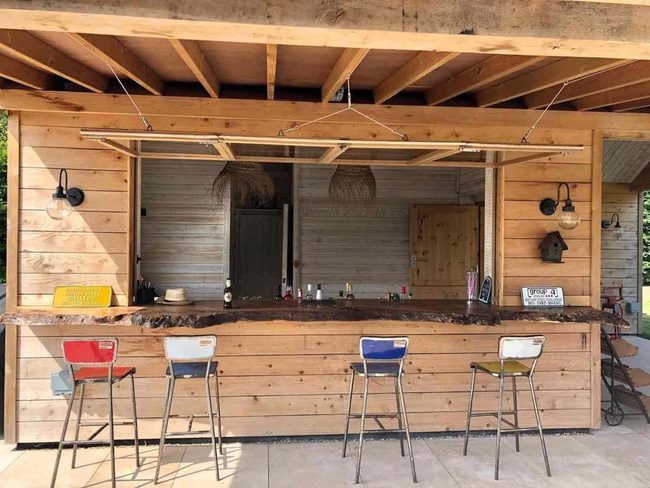 Natural Wood Bar In Colorful Garden
