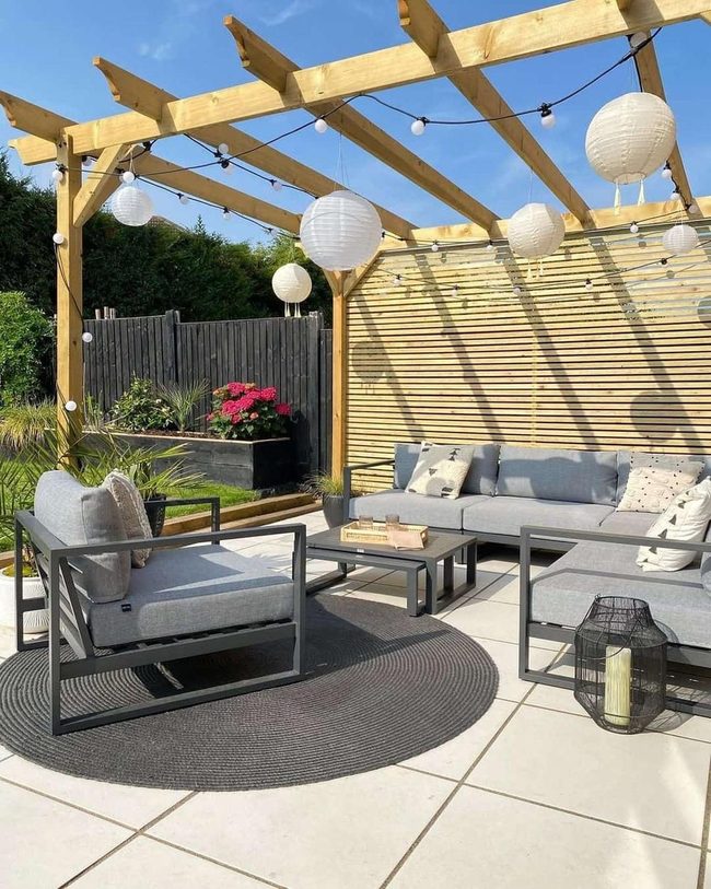 White Paper Lanterns Over Gray Seating