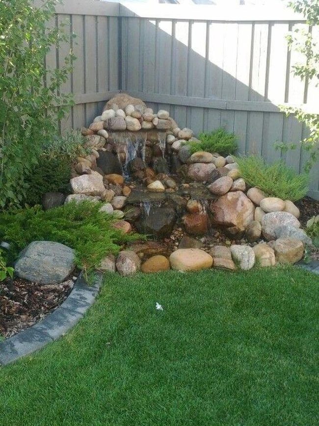 Flowing Water Among Garden Stones