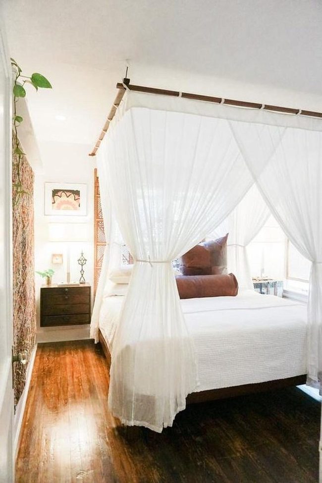 Sunlit White Bedroom With Natural Wood