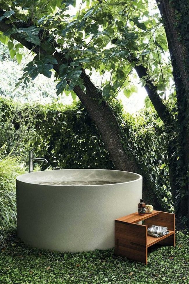 Hidden Hot Tub Among Green Foliage