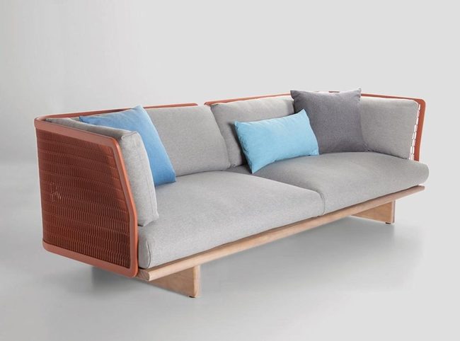 Bright Blue Pillows On Gray Sofa