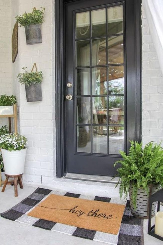 Black Glass Doors White Brick Entry