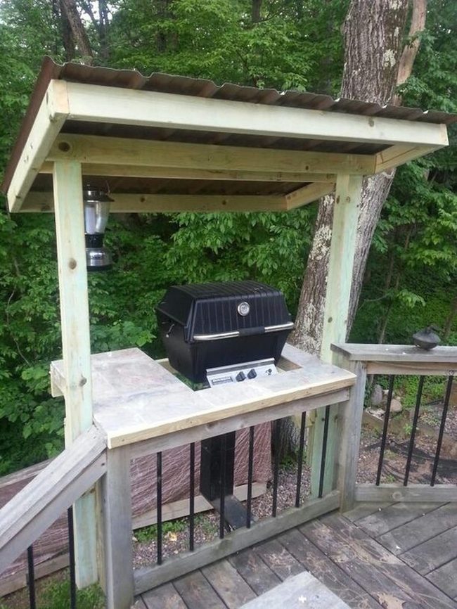 Wood And Black Metal Outdoor Kitchen