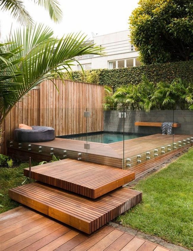 Dark Wood Meets Transparent Glass Pool
