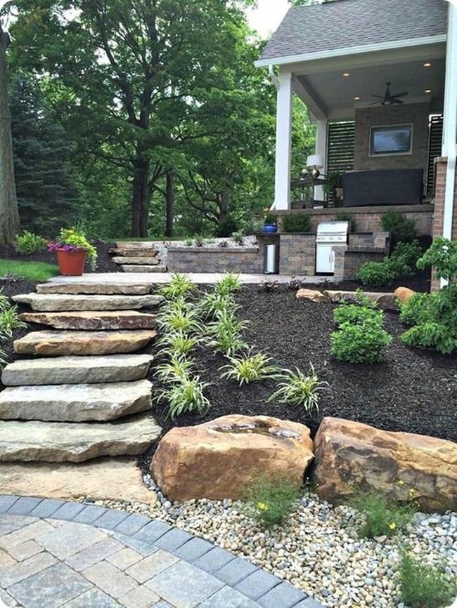 Brick Grill Patio With Stone Steps