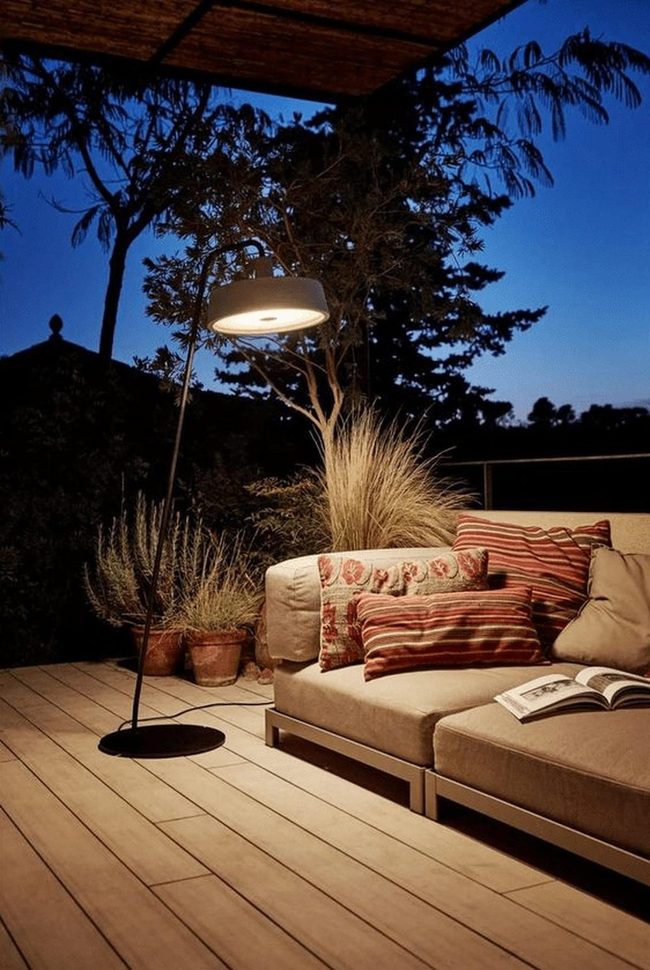 Beige Sofas With Striped Pillows Outdoors