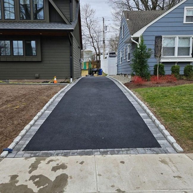 Structured Paver Borders Define Driveways