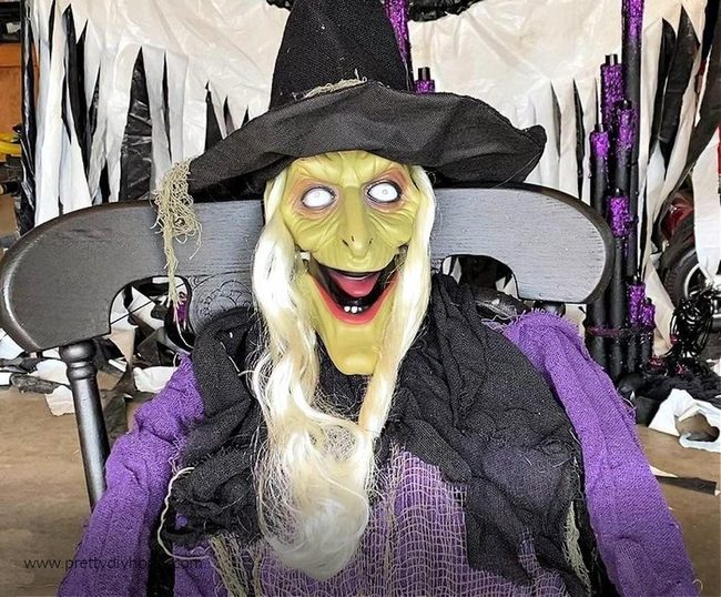 Life-Sized Black Witch on Chair
