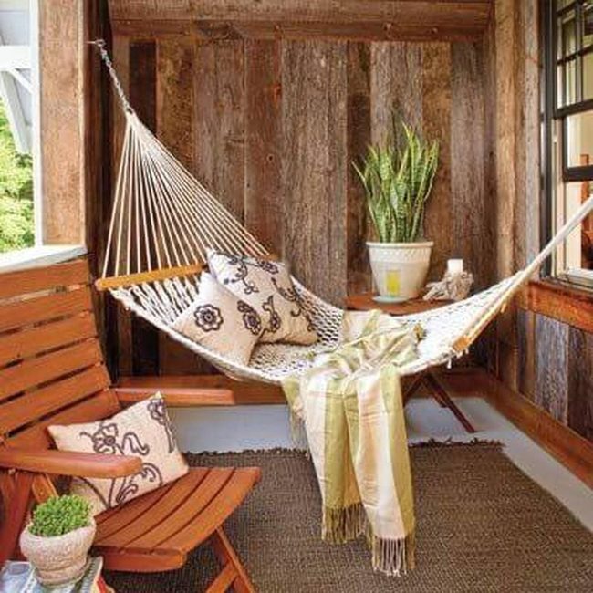Pillow-Laden Hammock Porch Retreat