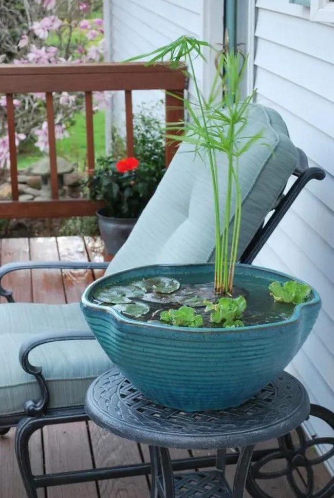 Light Blue Porch With Red Flowers