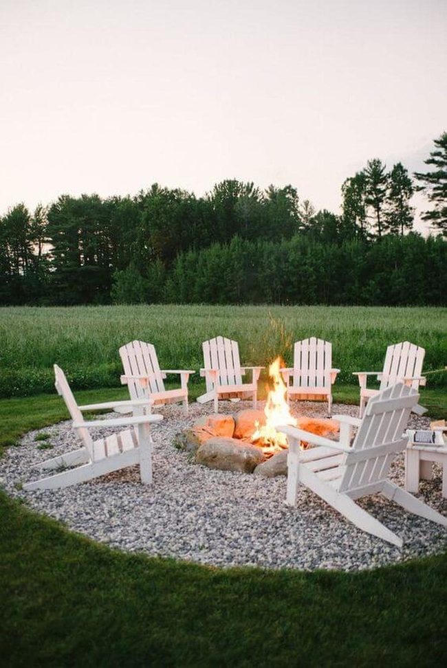 White Chairs Around Crackling Fire