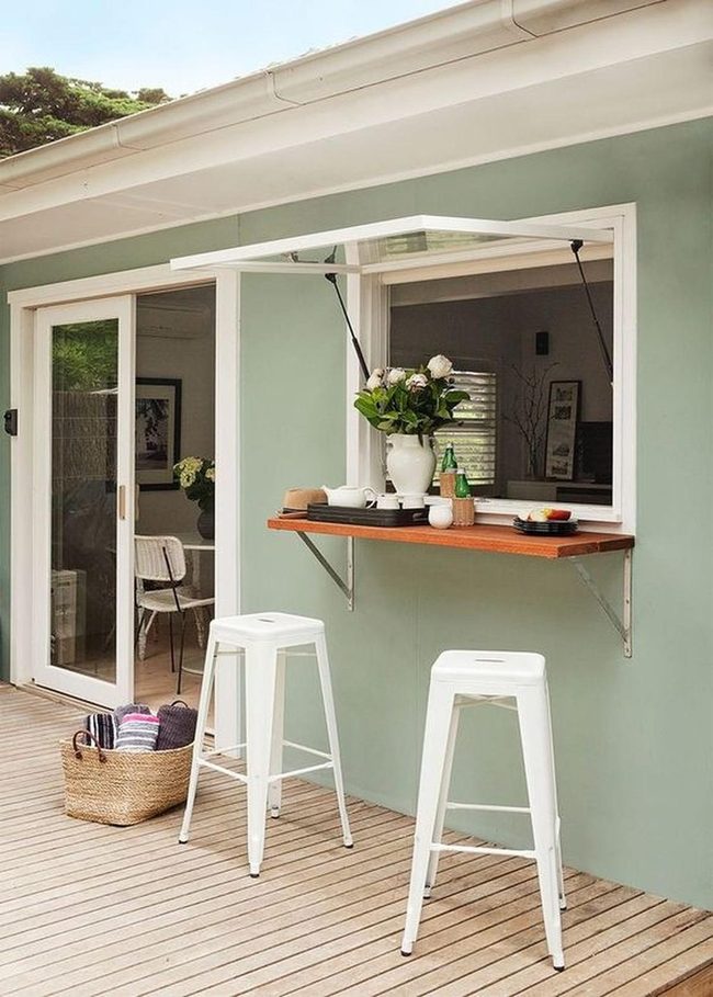 Green Walls, White Stools, Wooden Deck