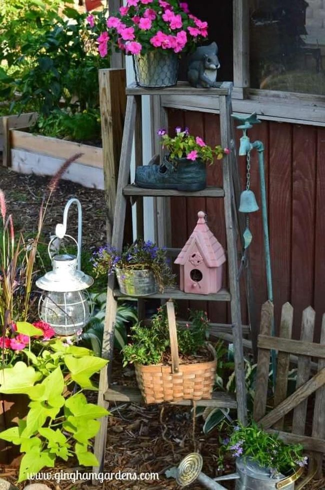Weathered Garden Tools With Blooming Flowers