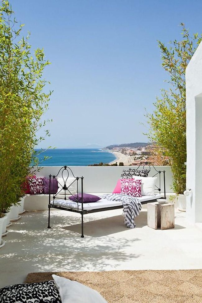 Black Daybed Meets Mediterranean Sea View
