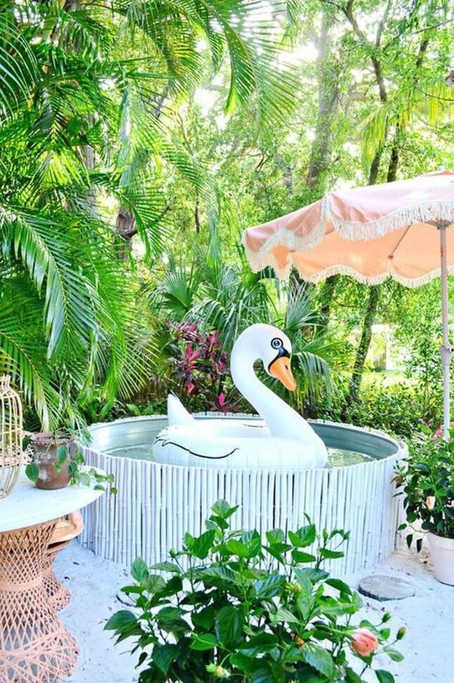 Green Palm Oasis With Swan Float