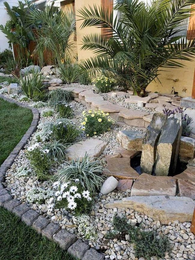 Smooth Stones Water Flowing Garden