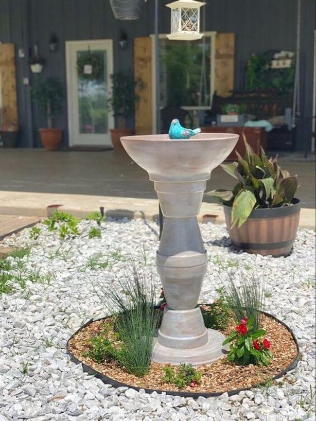Birdbath Garden Centerpiece With Colorful Flowers
