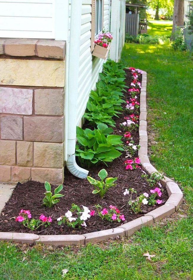 Curved Brick Frames Colorful Impatiens
