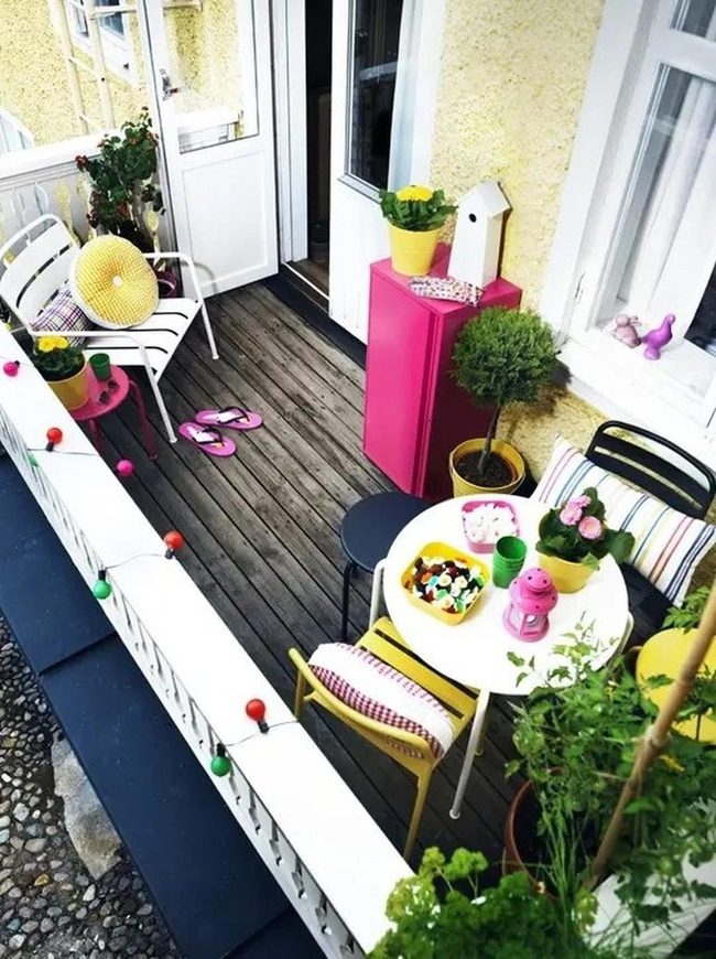 Yellow Blooms And Striped Cushions