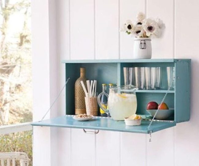 Blue Wall Shelves With Fresh Flowers