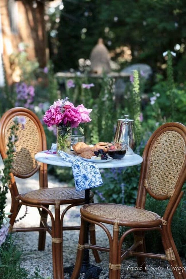 Bistro Set Surrounded By Living Walls