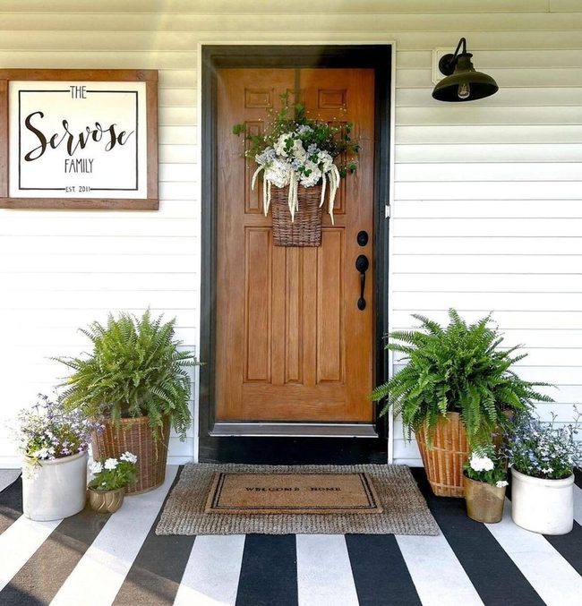Vintage Metal Pots Overflowing With Blooms