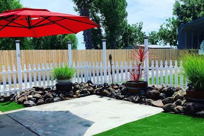 Orange Umbrella Low-Maintenance Oasis