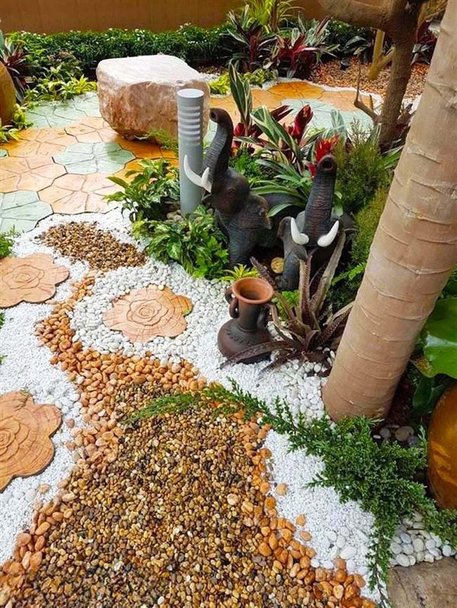 Colorful Stone Paths Through Green Art