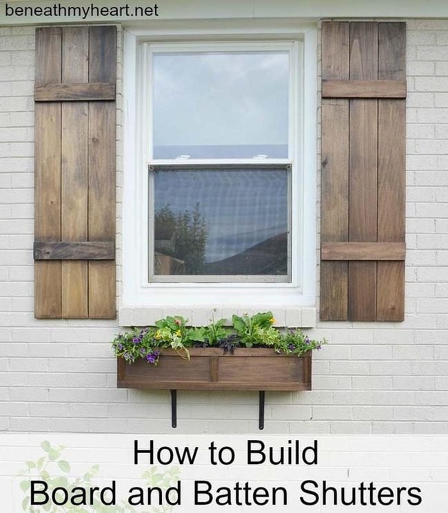 Wooden Shutters And Flowering Planters