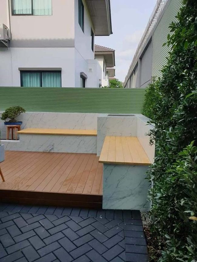 Floating Deck Surrounded By Living Plants